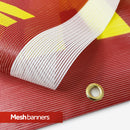 Close-up of wind-resistant mesh banner material